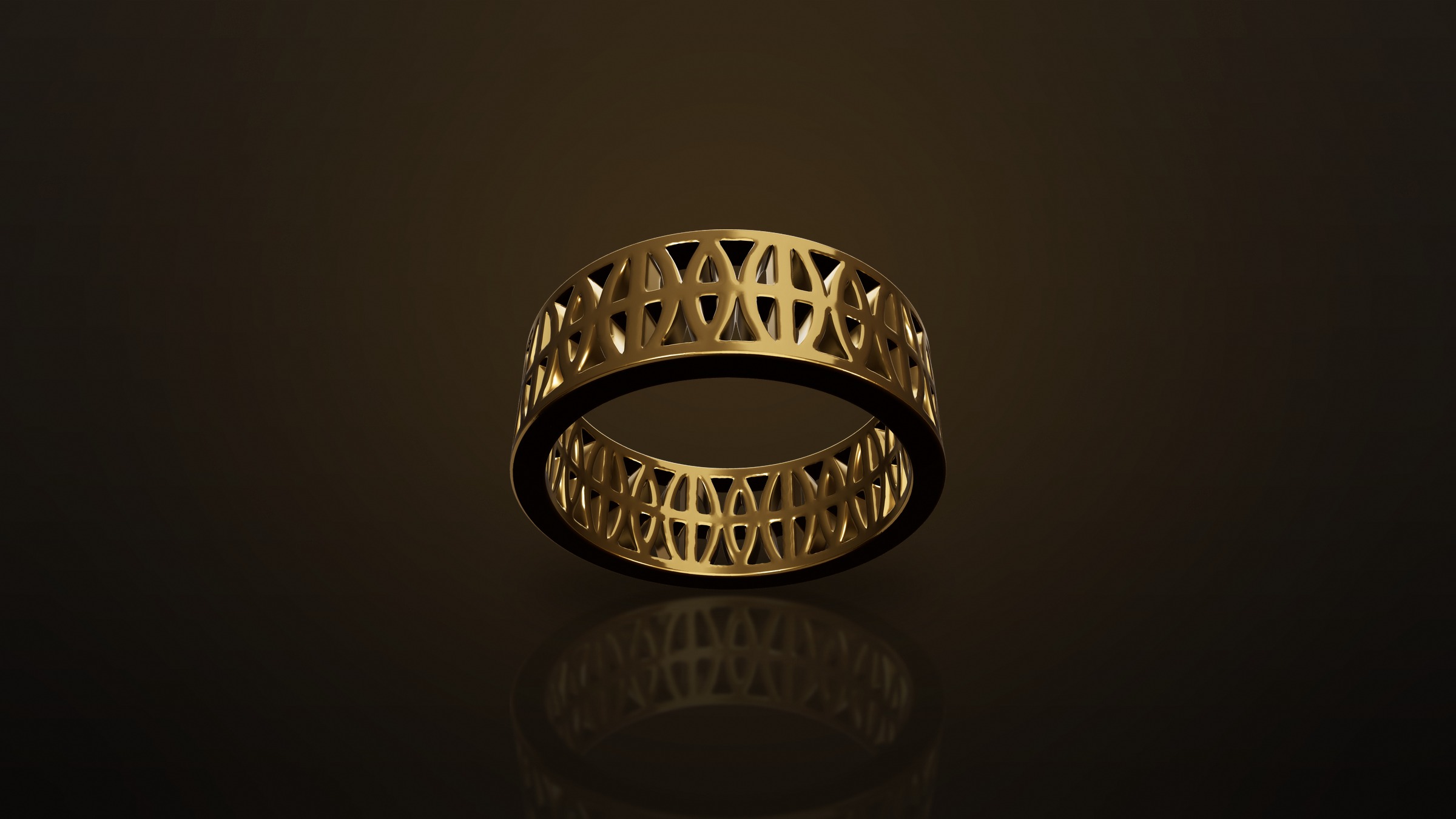 The Loyalty Band in 18k yellow gold, pierced openwork, on a dark ground